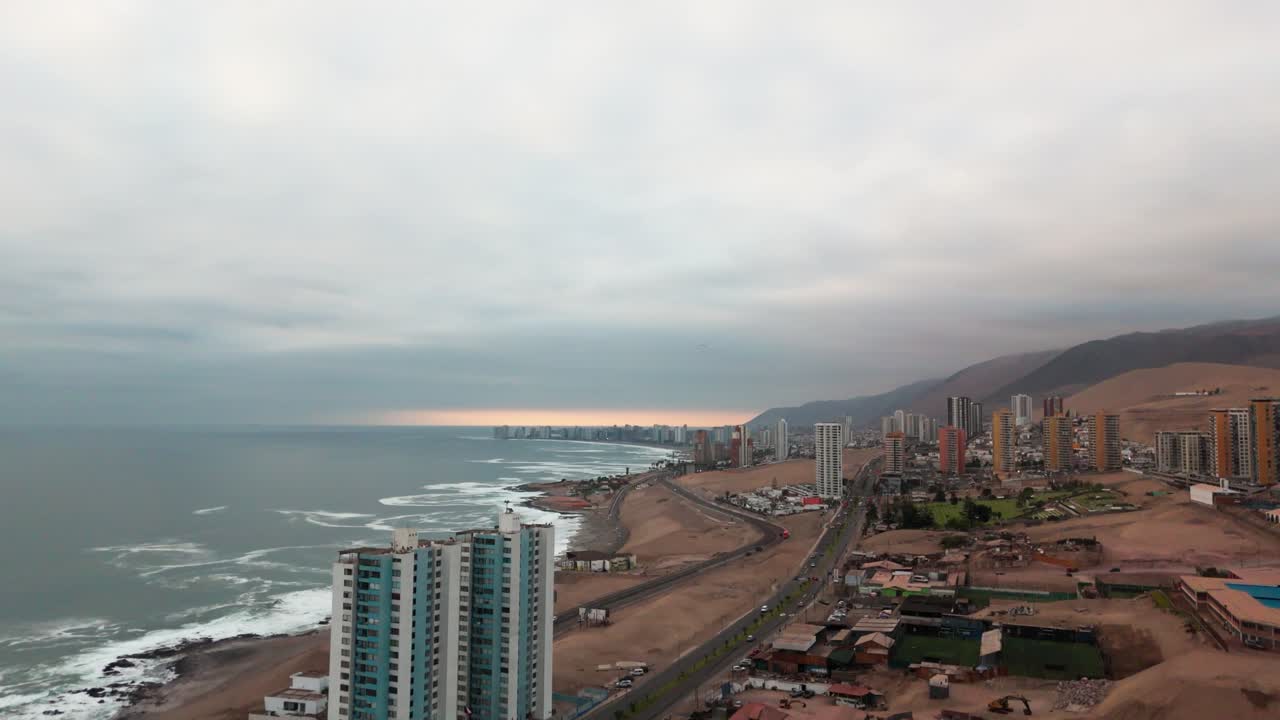 Iquique Chile Tarapaca Mountain Huayquique suburban sea ocean waves sand dunes dusk