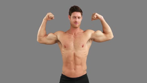 Muscular-man-flexing-his-muscles-