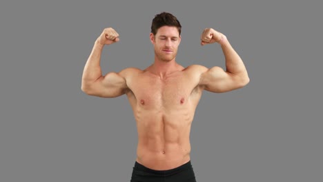 muscular man flexing his muscles