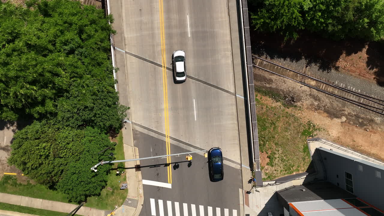 Birds Eye Aerial View Of Cars Traveling Through Downtown Raleigh, North Carolina