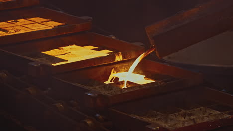 molten metal pouring into castings