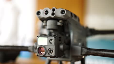 Close-up-of-industrial-drone-advanced-camera-and-front-sensors,-Czechia