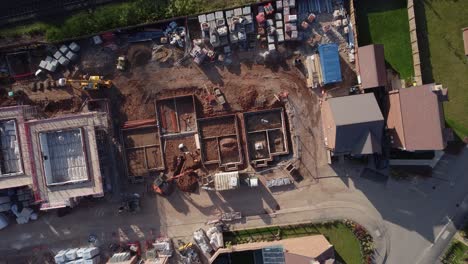 sitio de construcción de casas de construcción aérea vista de pájaro sobrecarga uk