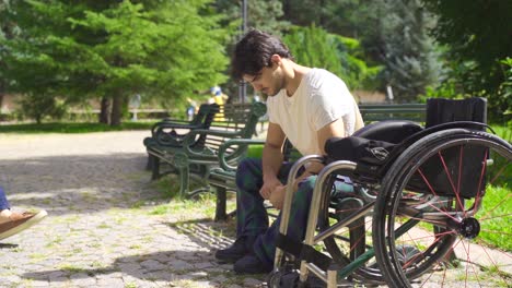 handicapped teenager shakes hands in slow motion. motivation and morale.