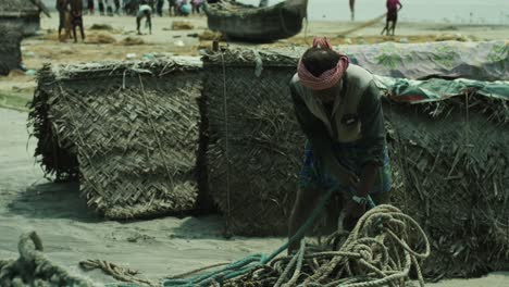 fisherman pulling a fishing rope