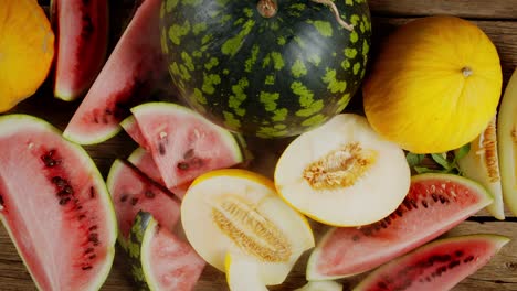 pieces of ripe watermelon and melon with a cool steam.