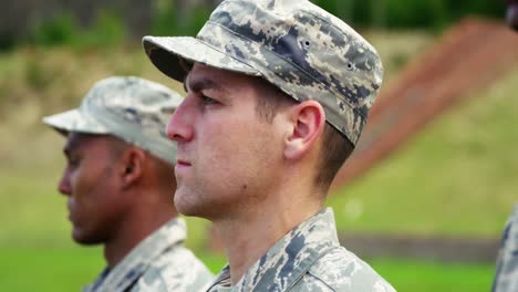 group of military soldiers standing in line 4k