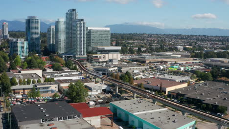 skytrain on railway from marine drive station in vancouver, british columbia, canada