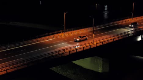 with a night bus across the nagara bridge in gifu, japan