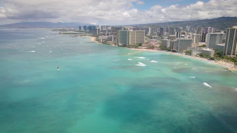 beach aerial drone view in waikiki, honolulu, oahu, hawaii