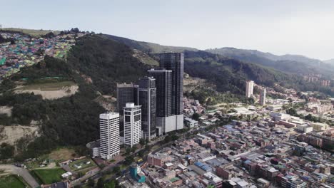 orbit shot of cityscape and high buildings around bogota, colombia
