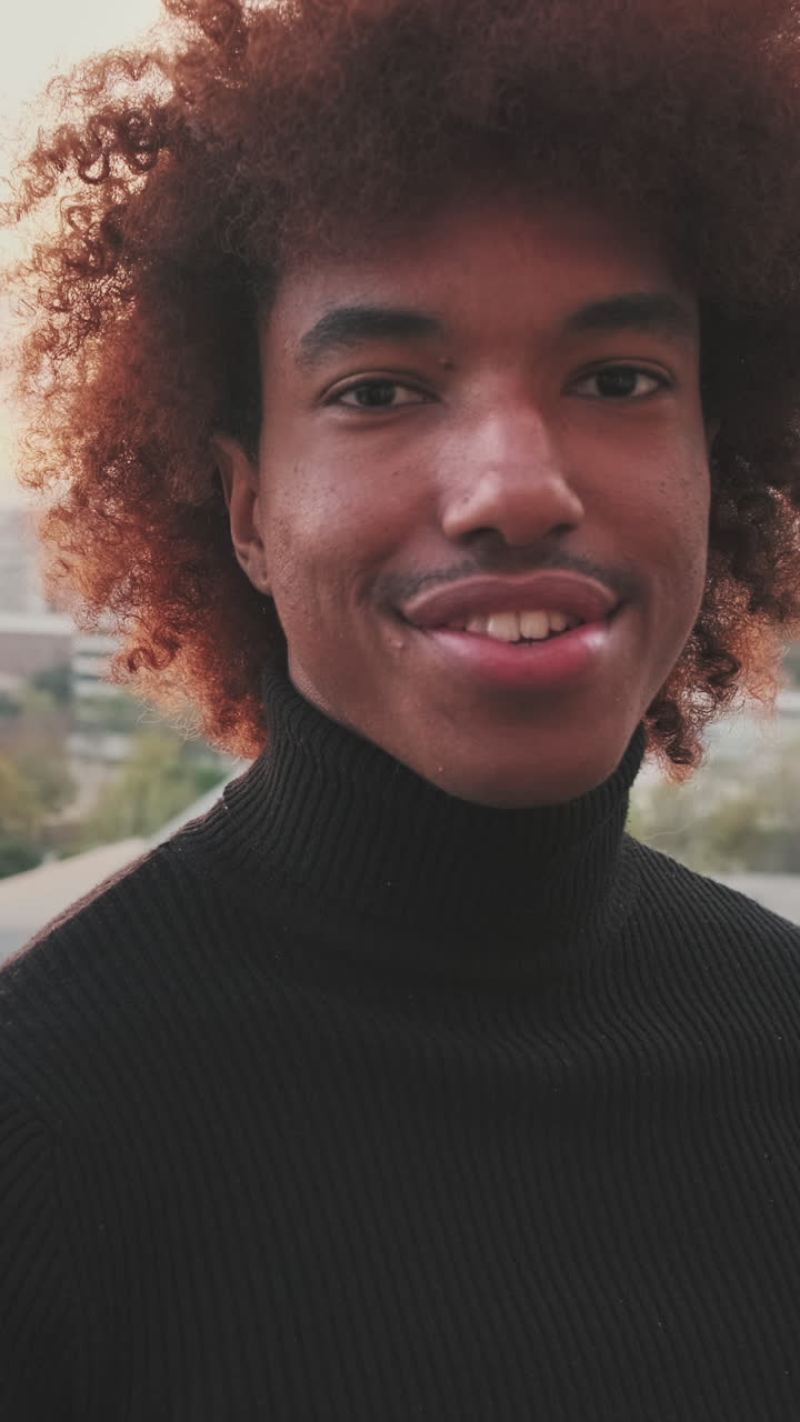 Portrait of a man with curly hair