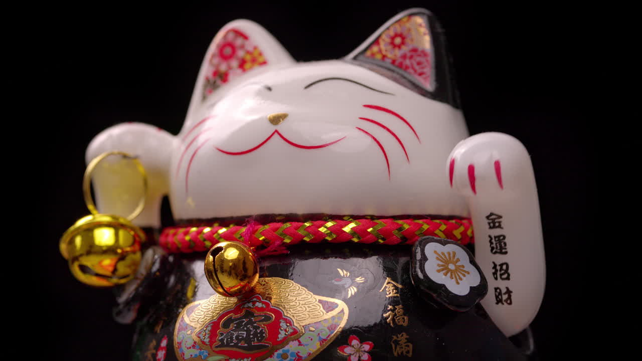 el gato de la suerte manejo agita