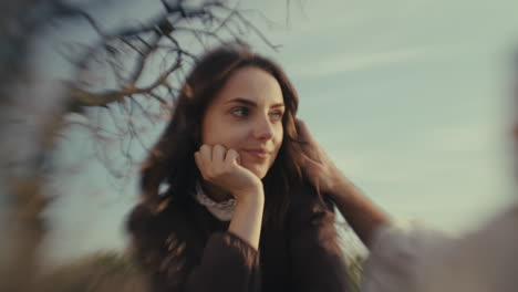 serene young woman in a gentle outdoor moment