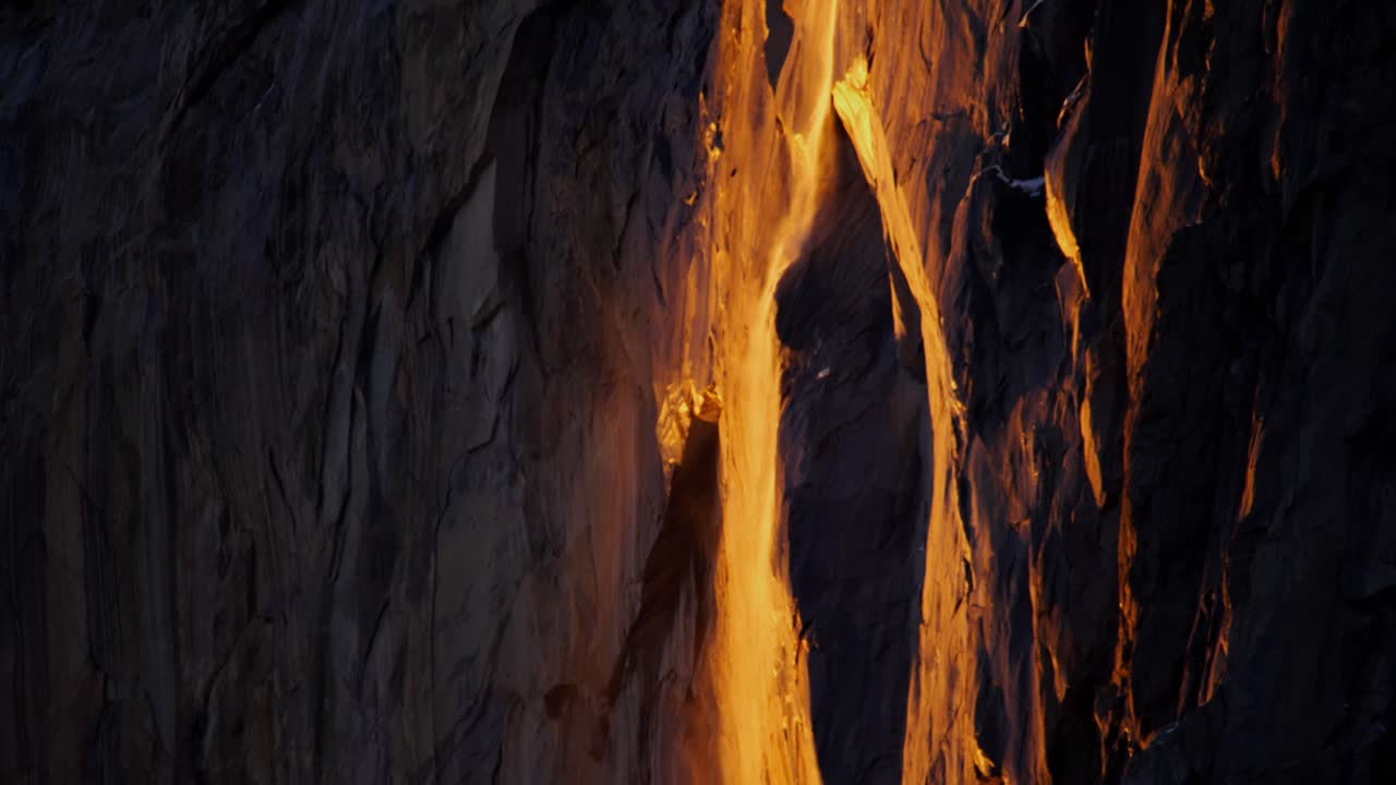 Close tilt up of firefall event in Yosemite National Park's Horsetail Falls