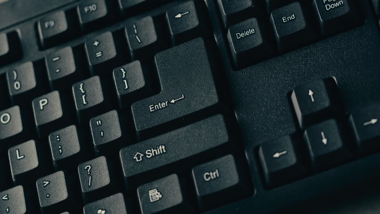 Finger Pressing Key on a Keyboard