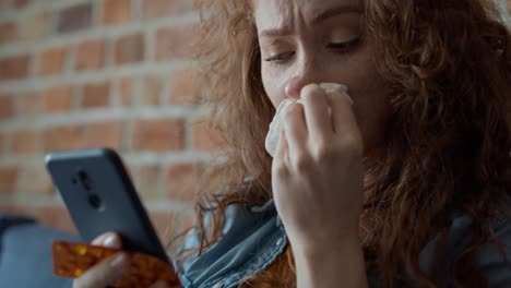 Caucasian-woman-at-home-checking-composition-of-some-medicines.