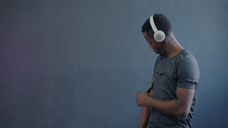 man working out with headphones