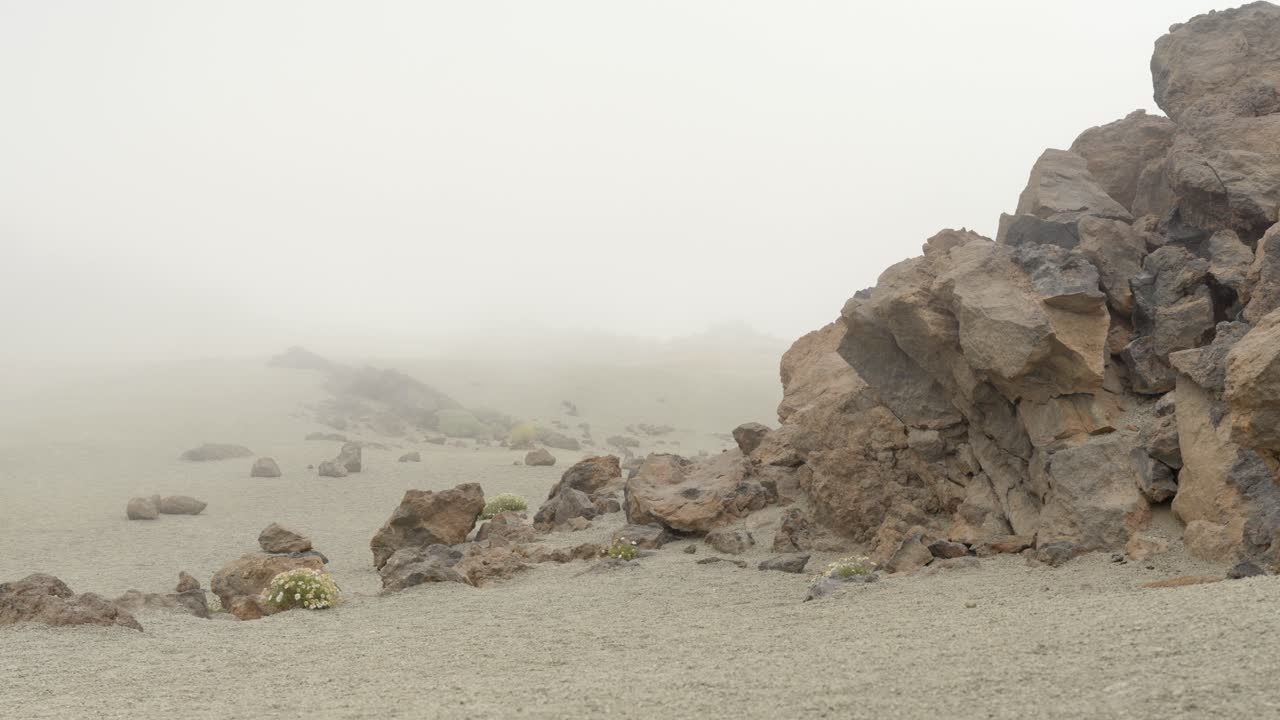 Rocky desert covered in fog, Teide, Tenerife island, Spain