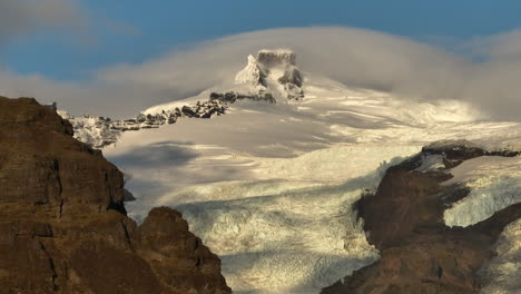 compression aerial shot and reveal of a glacier in iceland