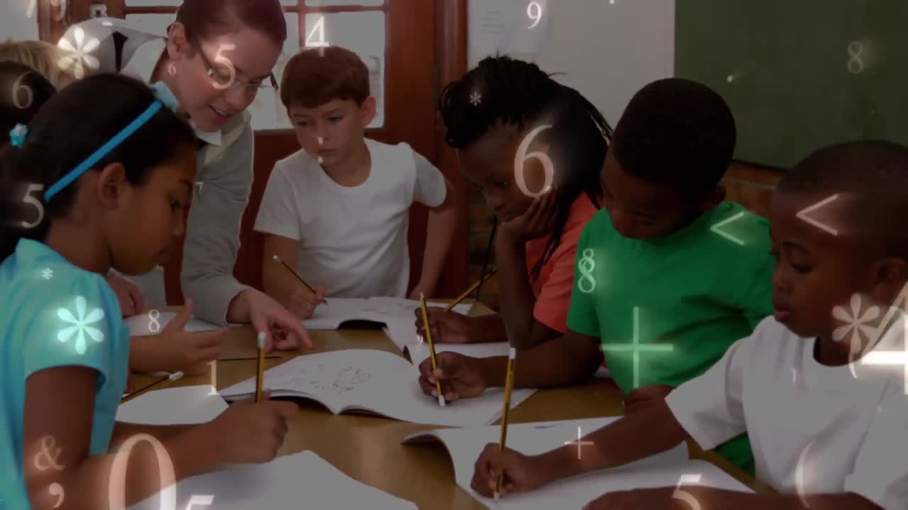 Group of kids in class studying with their teacher