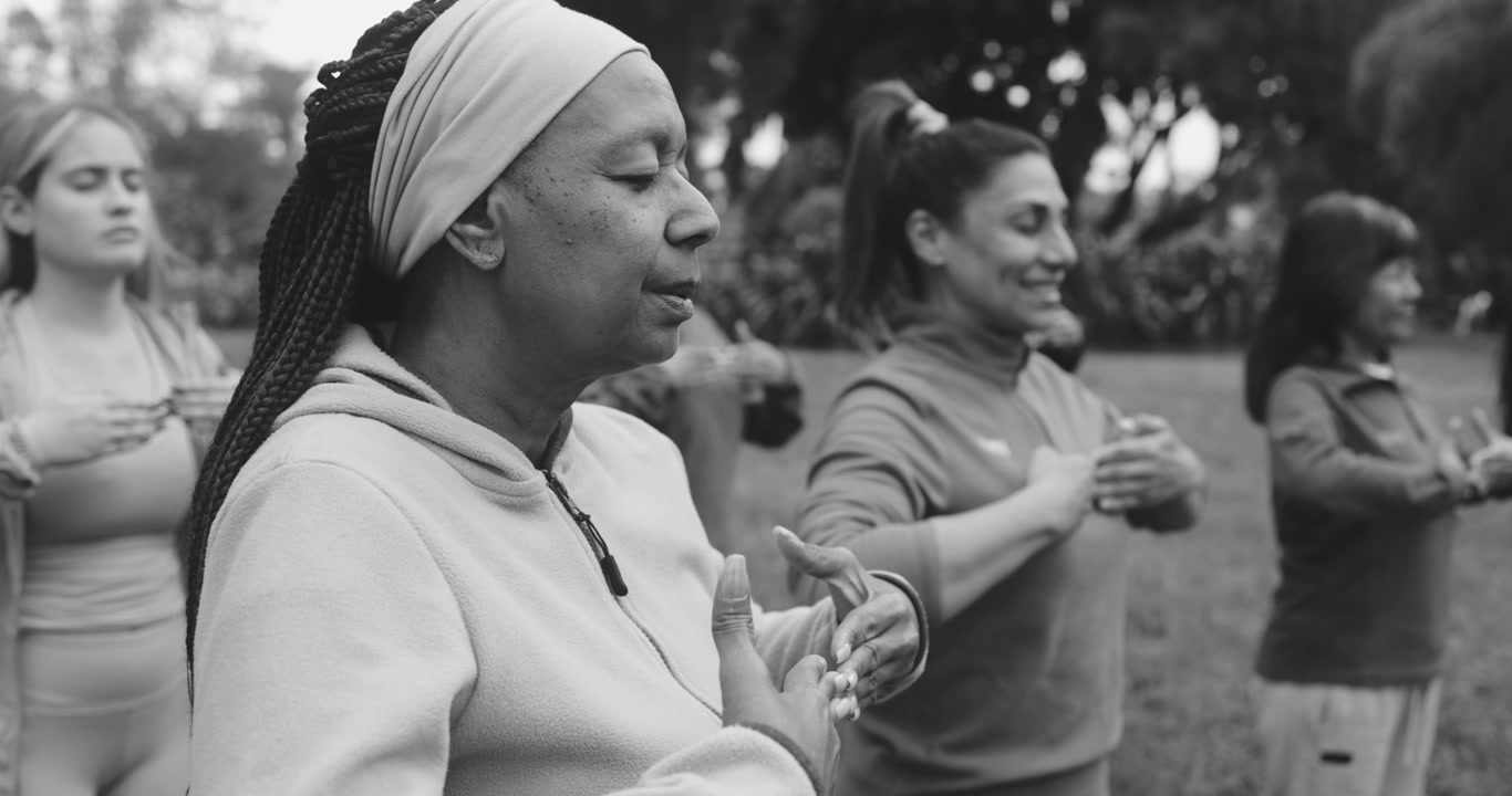 Diverse Group of Women Practicing Tai Chi in Park