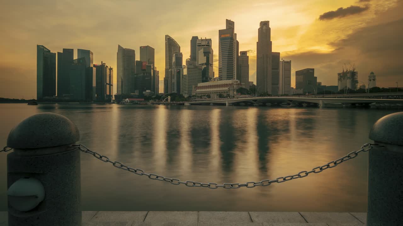 Time-lapse of Singapore skyline and esplanade at dusk