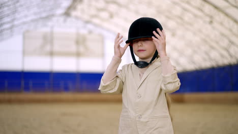 young girl in riding gear