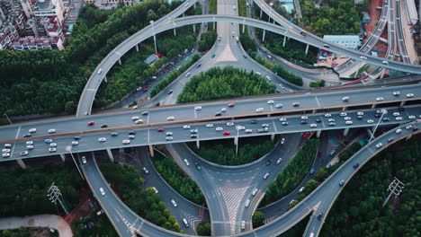 aerial photography of urban atmosphere viaduct busy multilevel interchange overpass in shanghai showing morning traffic flow coming from the elevated roads