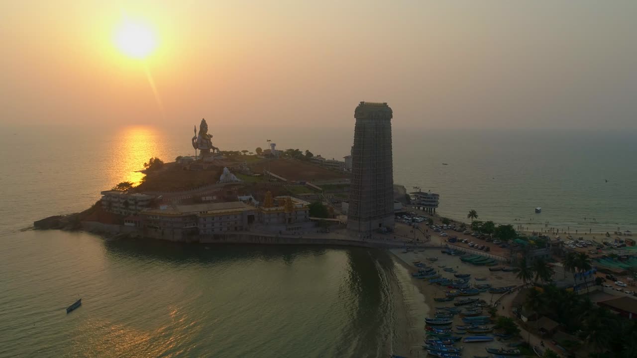 murudeshwar shiva statue south india drone sunset round beach and sea