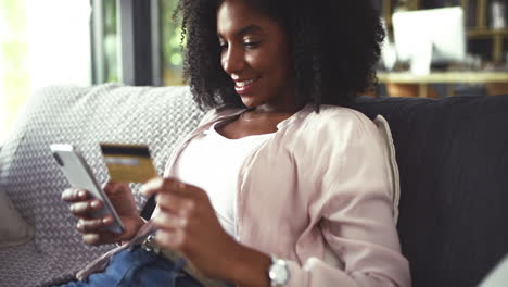 a young woman using a cellphone