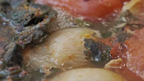 mouthwatering vegetable soup being cooked for the heart - extreme close up