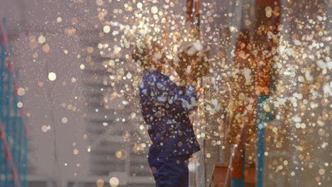 animation of glowing spots of light over caucasian man carrying box working in warehouse,