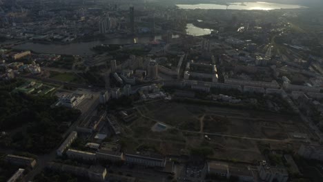 aerial view of a cityscape with river and construction