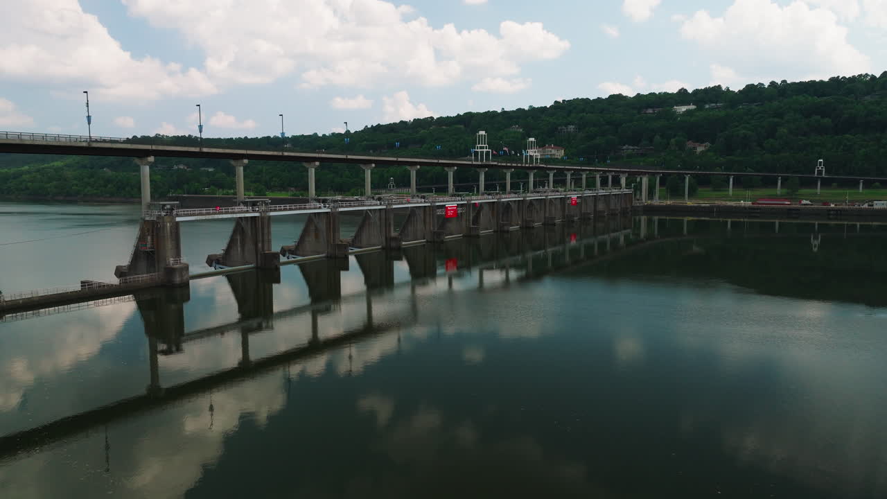 Big Dam Bridge With Perfect Mirrored Reflections On Water In Little Rock, Arkansas