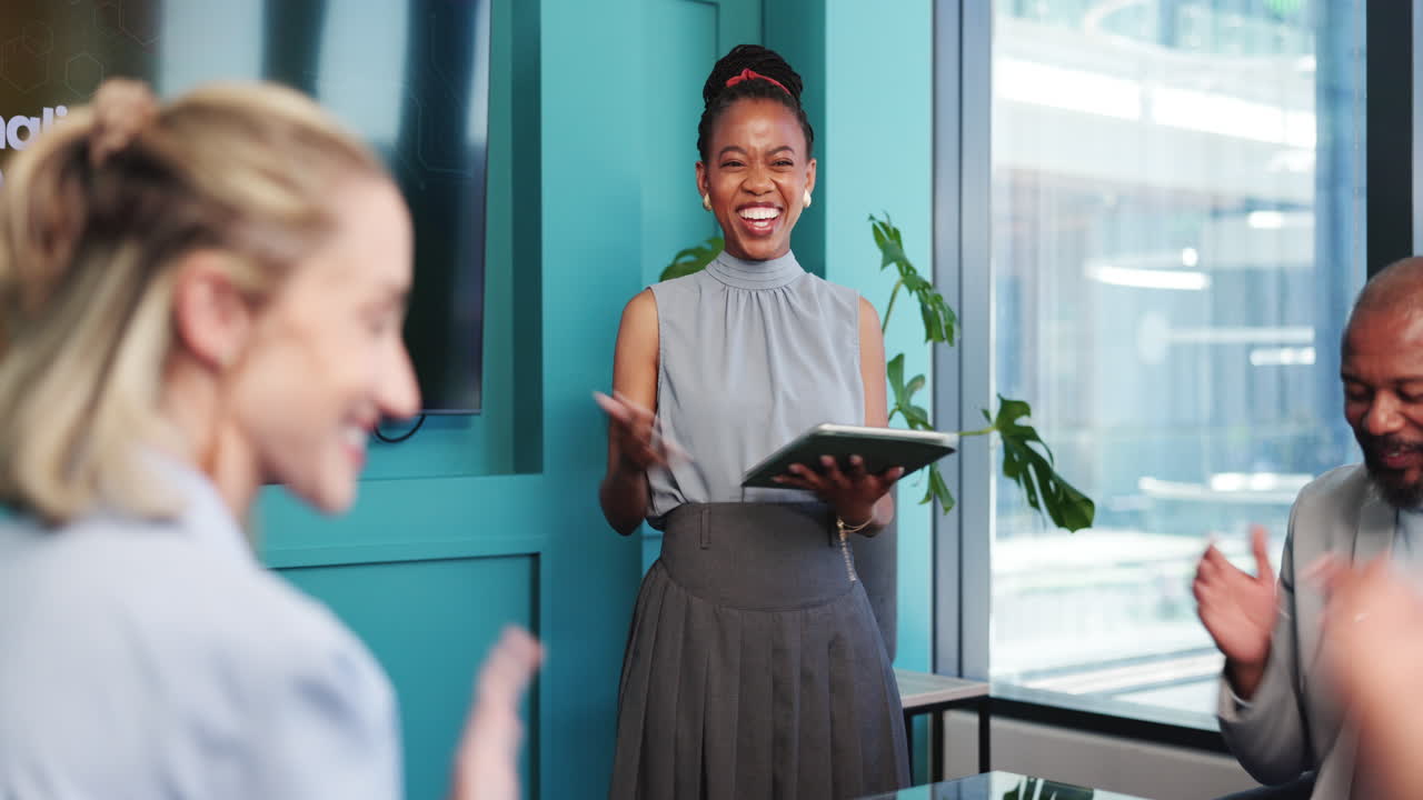 Happy Businesswoman Presenting with Tablet in Modern Office Meeting