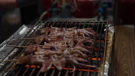 squid cooking at keelung street market: a sensory feast in taiwan