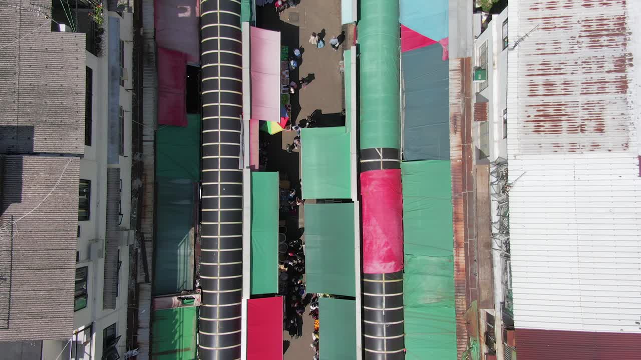 Aerial view of Ngau Chi Wan wet market rooftops, downtown Hong Kong with fresh Meat and Fish stalls.