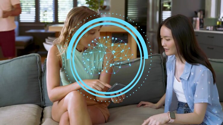 Tech net graphic appearing over phone, left woman holding and tapping, right woman pointing sharing