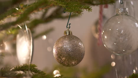 Beautiful-Christmas-tree-decoration,-glitter-ornament,-shiny-glass-baubles,-Sliding-Dolly-Shot-close-up