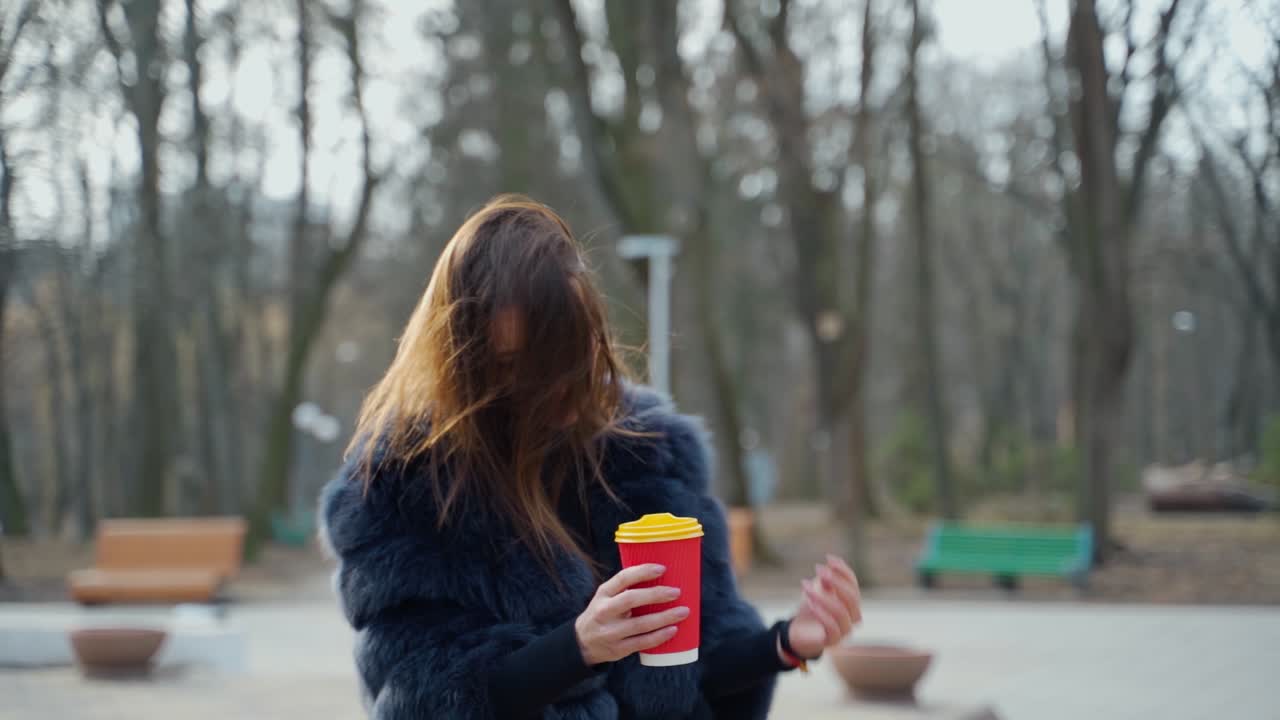 Woman posing in the park. Pretty young woman posing outdoors in nature
