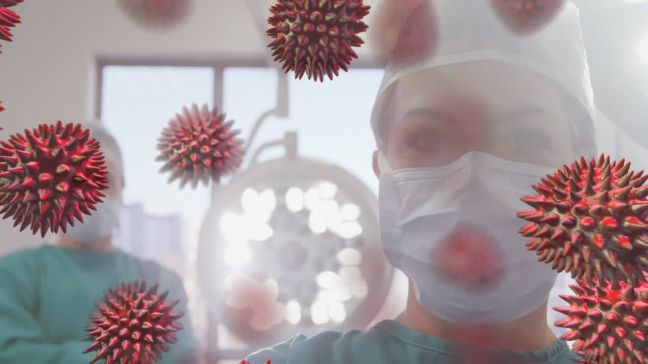 Animation of spreading coronavirus covid19 with healthcare worker in background