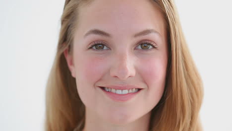 attractive blonde woman looking at the camera