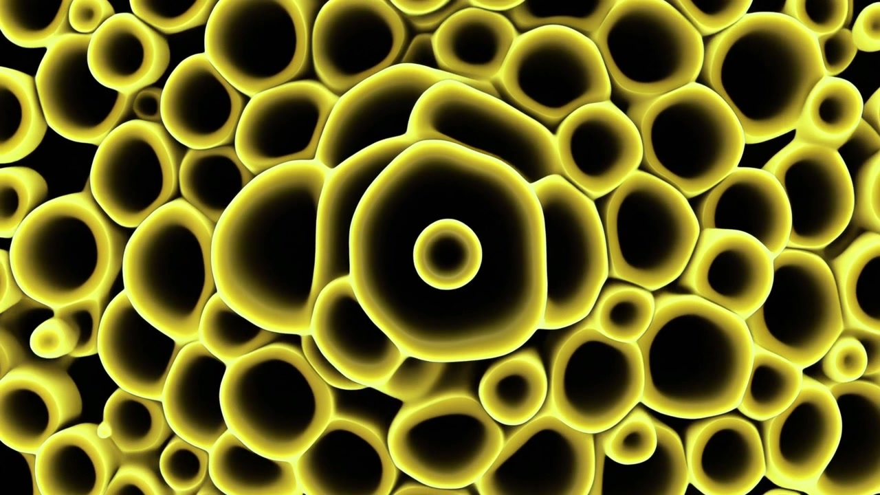 Animazione astratta di strutture cellulari gialle luminose