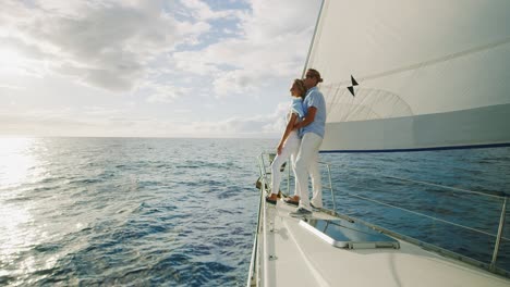 couple sailing into the sunset