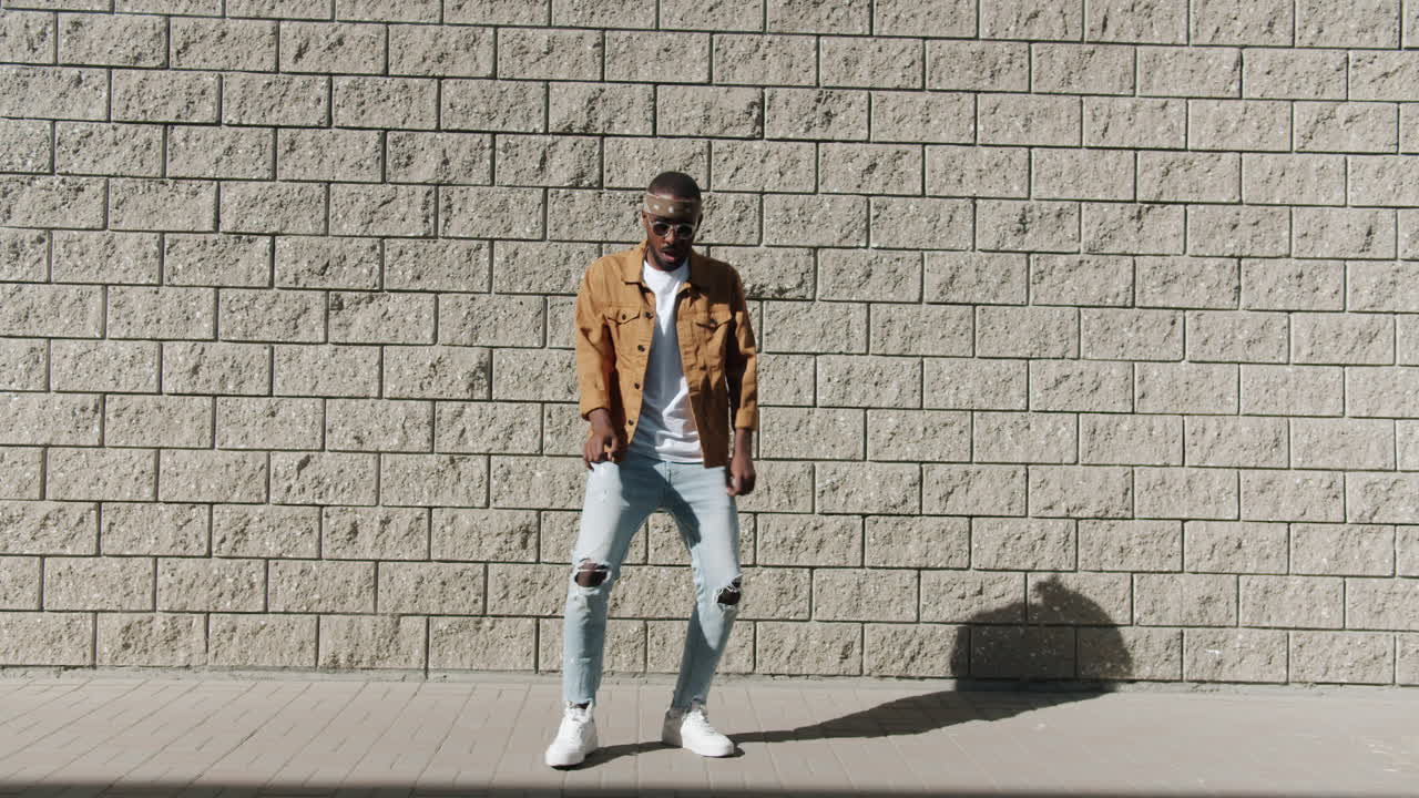 Man Dancing in Urban Setting