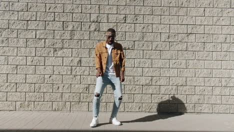 man dancing in urban setting