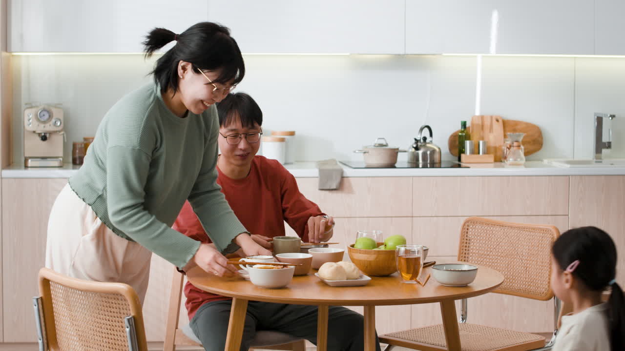 Family Dinner in Modern Kitchen