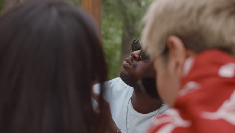 man eating fast food outdoors