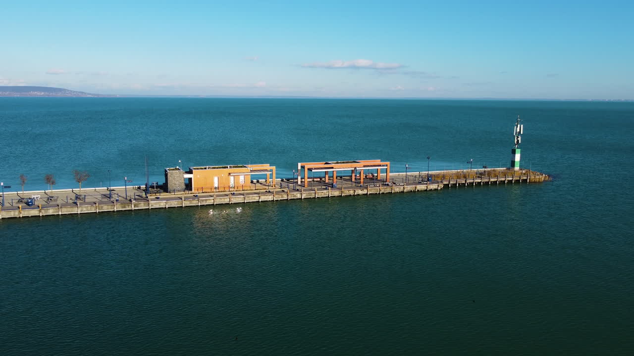 Aerial view of boats docked at Hajokikoto on Lake Balaton under clear blue skies in Hungary